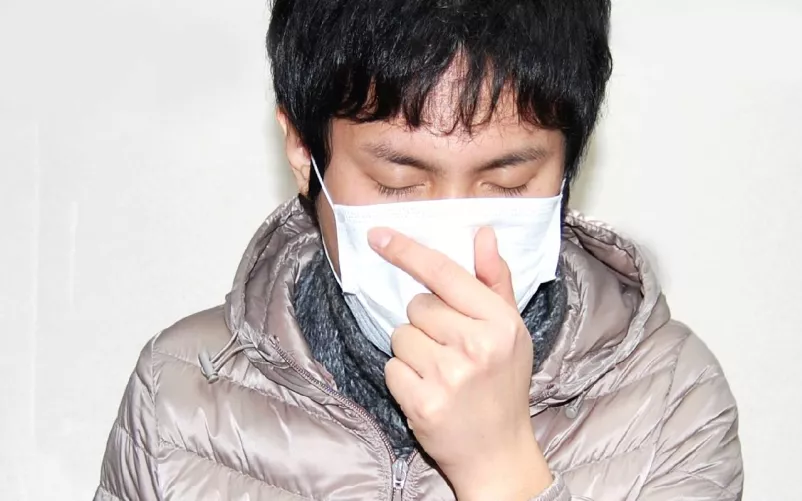 Szájmaszkot használó beteg...